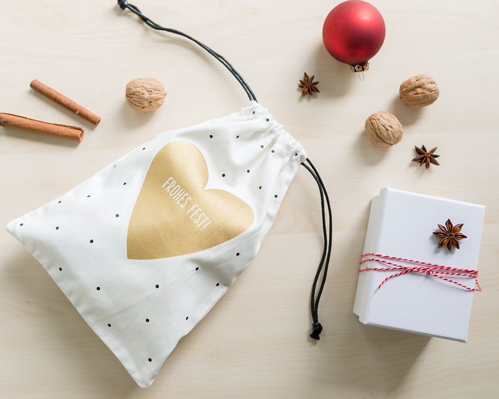 Weihnachtsgeschenkbeutel "Frohes Fest" mit Herz, 100% Baumwolle Weihnachtsgeschenkbeutel "Frohes Fest" mit Herz, 100% Baumwolle