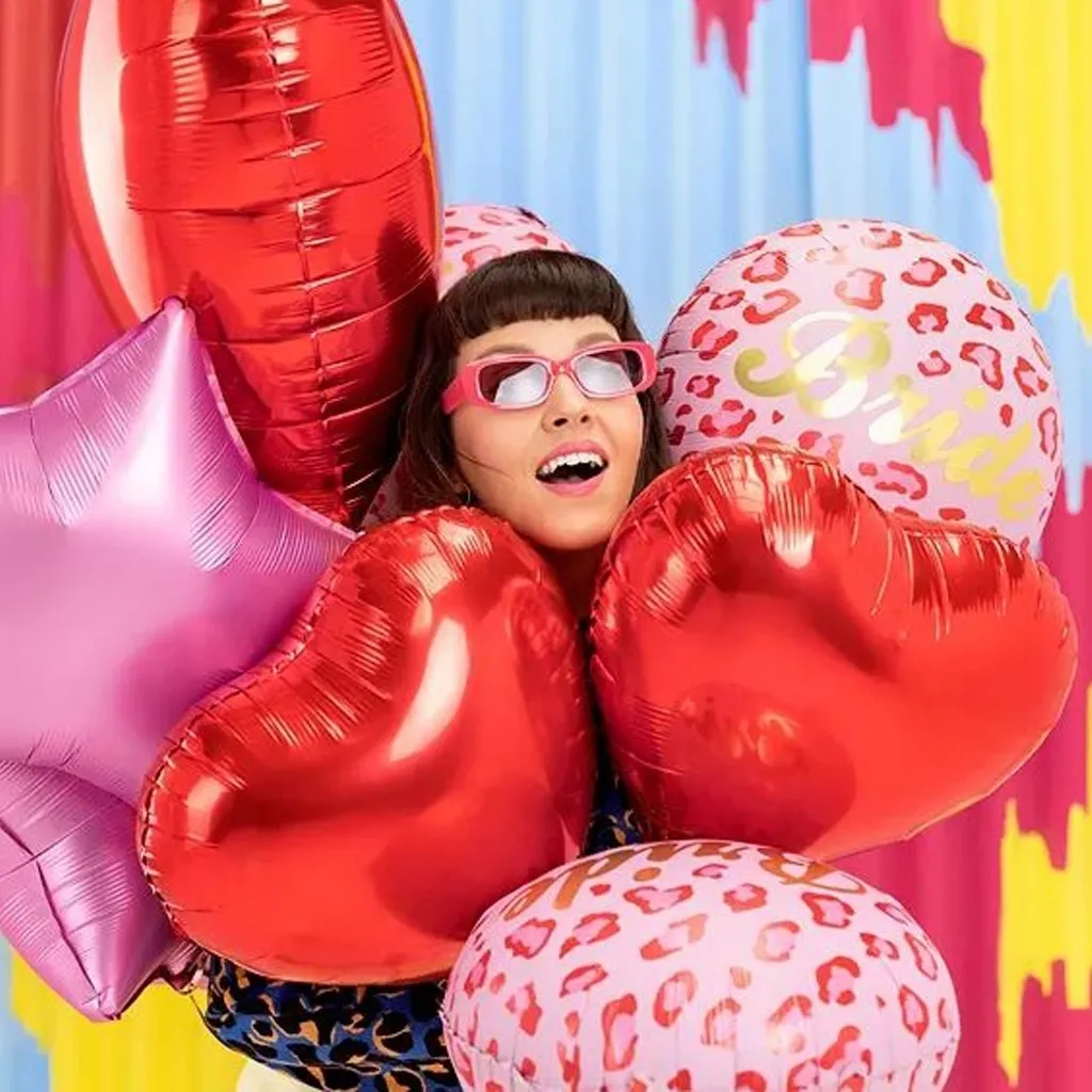 balloons, gloves, frau, pinkes schlaufen, party-dekoration