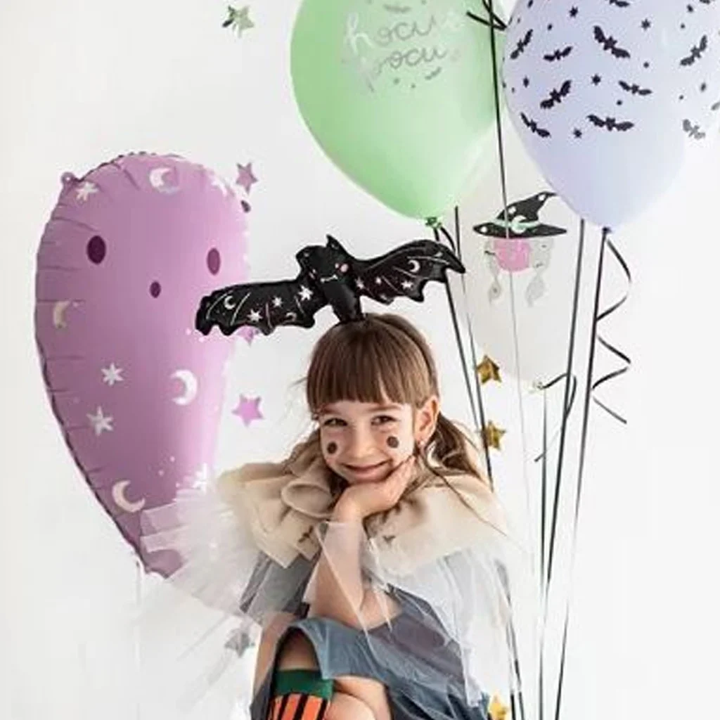 balloons, girl, bat headband, face paint, tulle cape