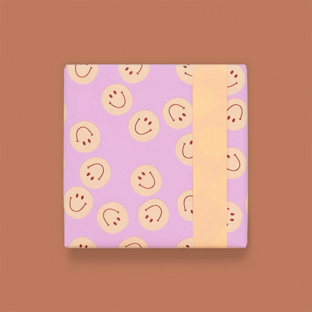 Geschenkverpackung, Geschenkbox, Lila Muster, Geschenkband, Smiley-Muster