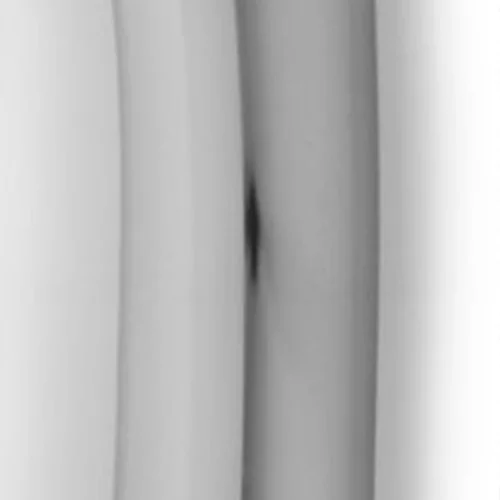 curved object, gray tones, sleeve edge, fabric fold, close-up